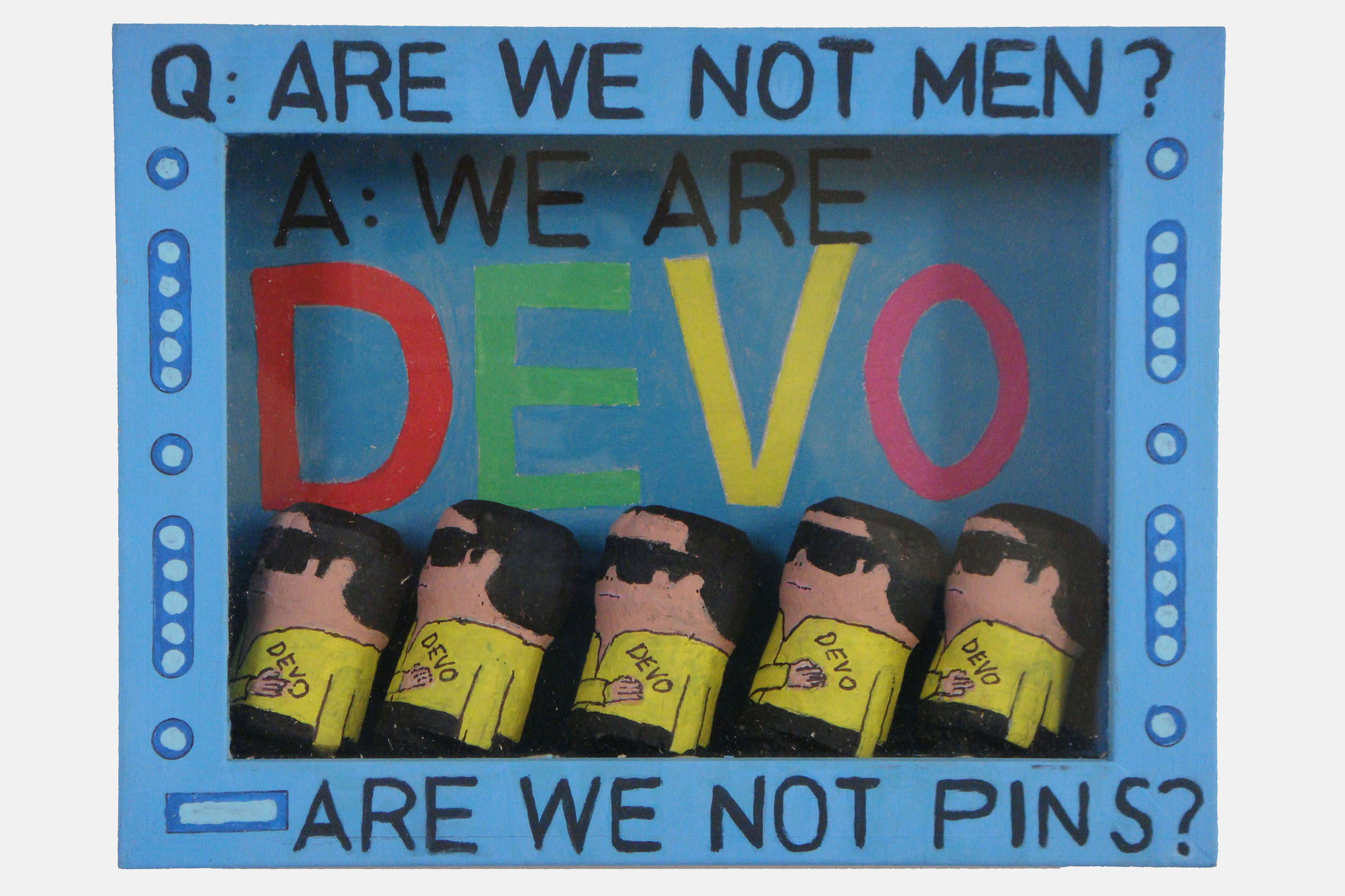 Devo<br><br>Mixed media and corks. Framed.